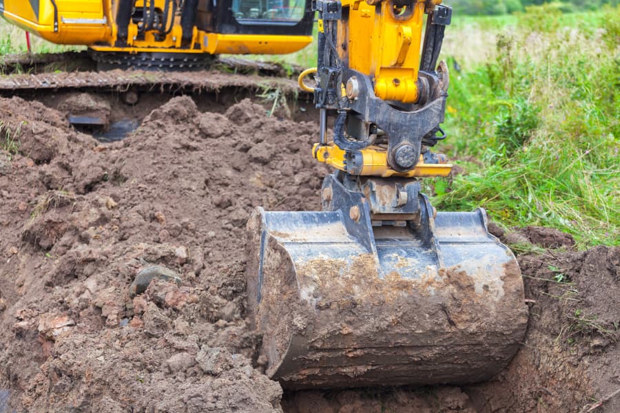 Excavation equipment removing contaminated soil