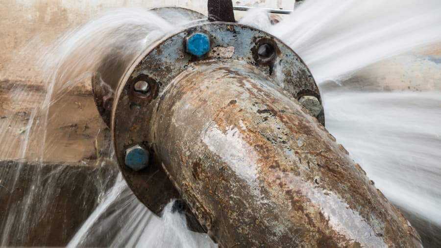 A burst water main leaking
