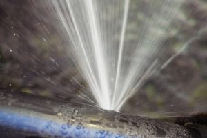 Broken pipe spraying water