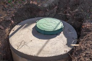 Septic tank with green lid