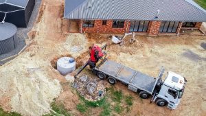 Septic tank being installed at residential home
